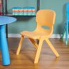 a yellow chair in a room