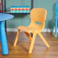 a yellow chair in a room